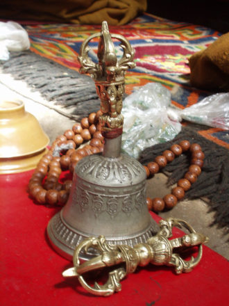 Vajra and bell and mala (prayer bead) - tantric buddhist ritual items. 